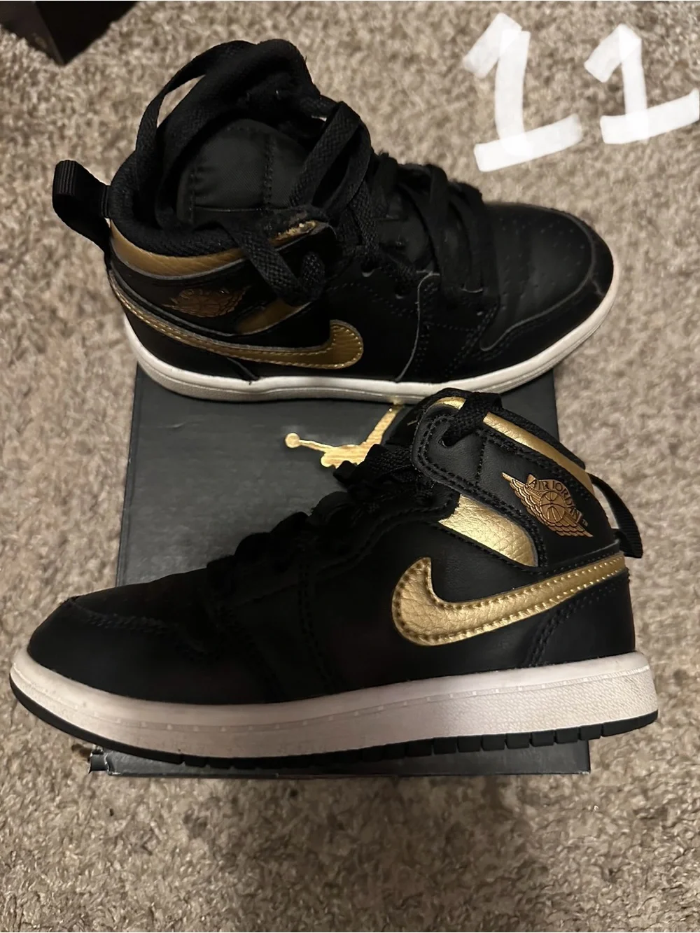 Jordan Kids Black and Gold High-Top Sneakers